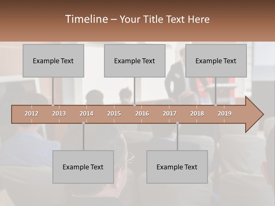 A Man Giving A Presentation To A Group Of People PowerPoint Template
