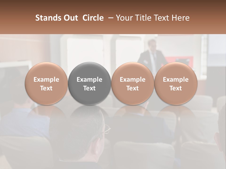 A Man Giving A Presentation To A Group Of People PowerPoint Template