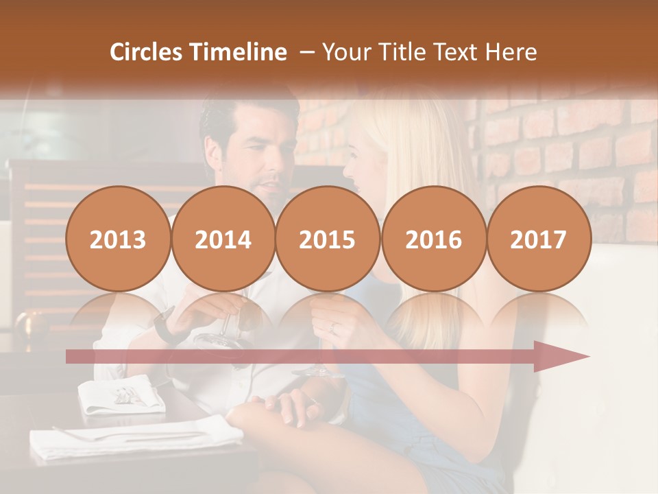 A Man And Woman Sitting At A Table Drinking Wine PowerPoint Template