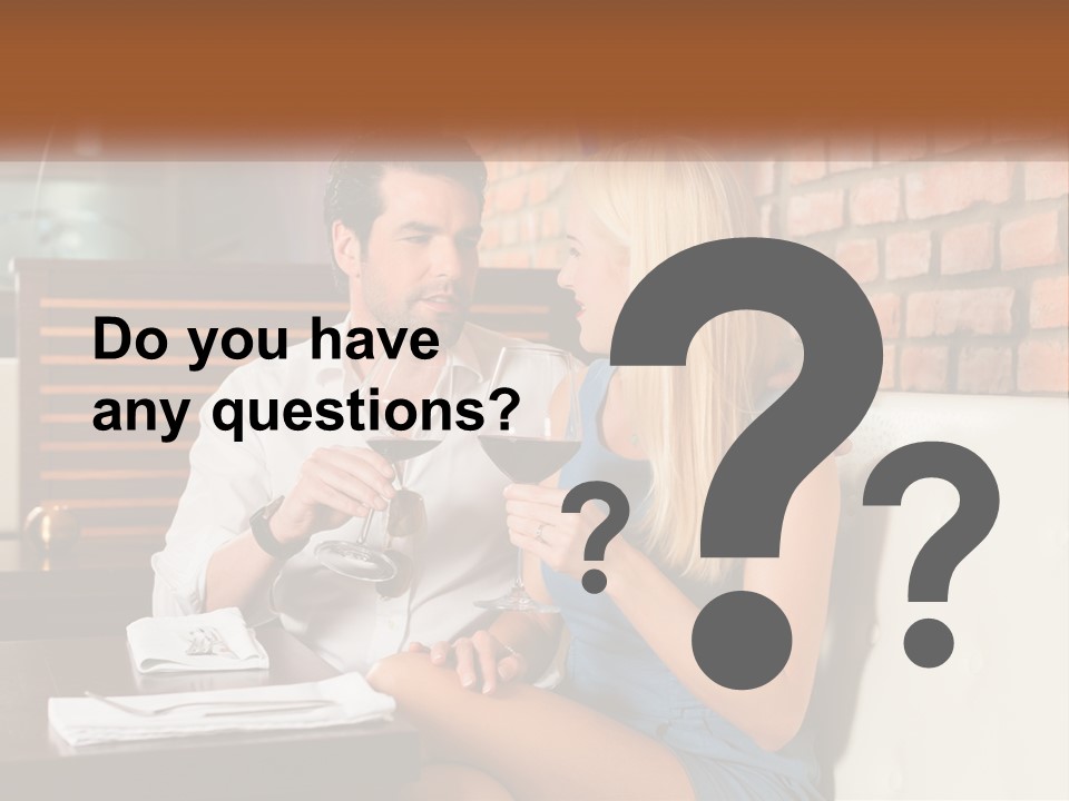 A Man And Woman Sitting At A Table Drinking Wine PowerPoint Template