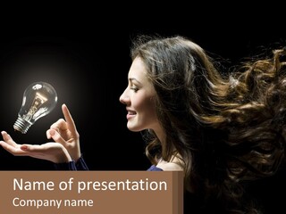 A Woman Holding A Light Bulb In Her Hand PowerPoint Template