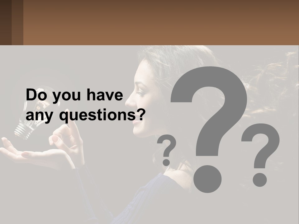 A Woman Holding A Light Bulb In Her Hand PowerPoint Template