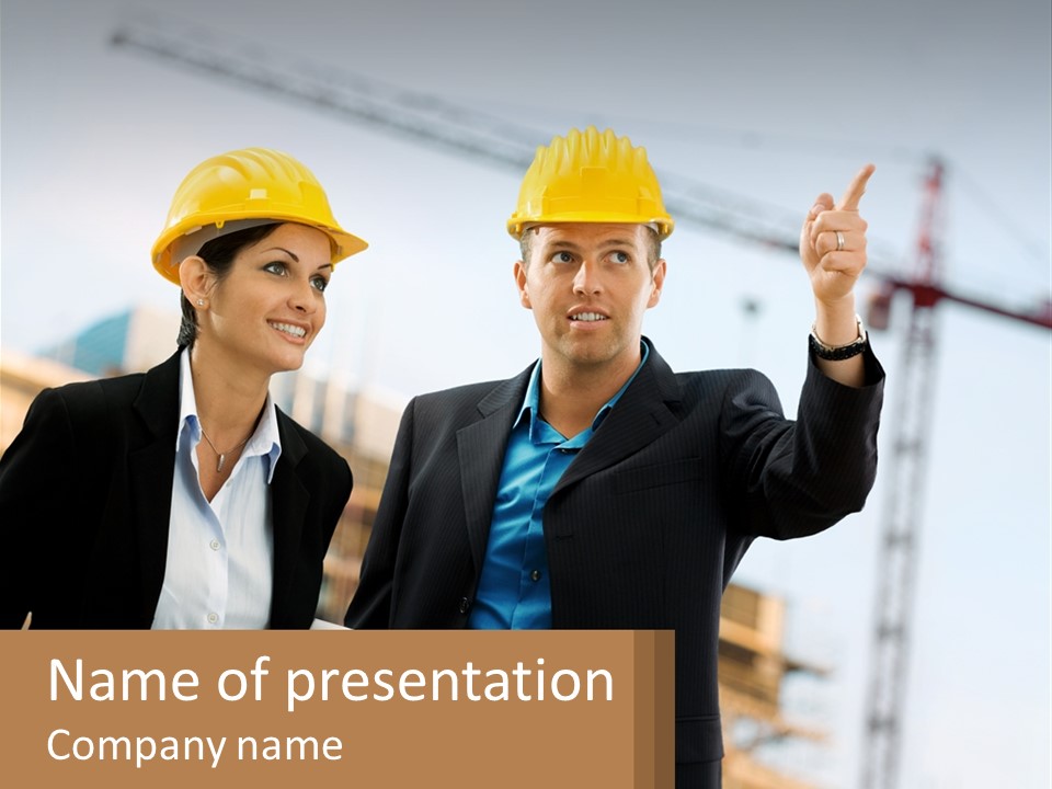 A Man And A Woman In Hardhats Giving A Thumbs Up PowerPoint Template