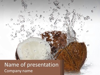 A Coconut With Water Splashing Out Of It PowerPoint Template