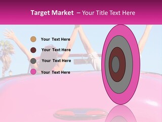 Two People Sitting In The Back Of A Pink Car PowerPoint Template