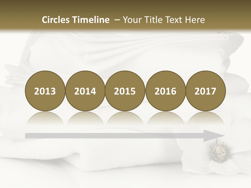 A Pile Of White Towels With A Flower On Top Of It PowerPoint Template