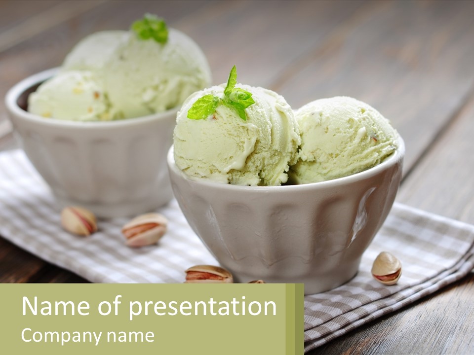 Two Bowls Filled With Ice Cream On Top Of A Table PowerPoint Template