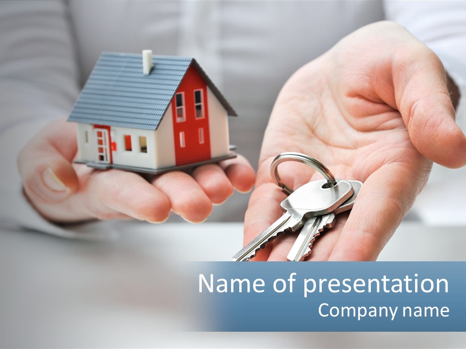 A Person Holding A House Key In Their Hands PowerPoint Template