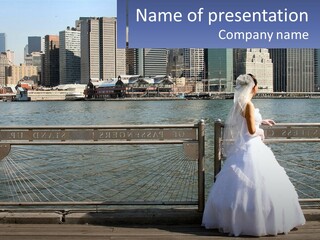 A Woman In A Wedding Dress Standing On A Pier PowerPoint Template