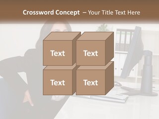 A Woman Sitting At A Desk In Front Of A Computer PowerPoint Template