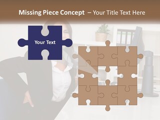 A Woman Sitting At A Desk In Front Of A Computer PowerPoint Template