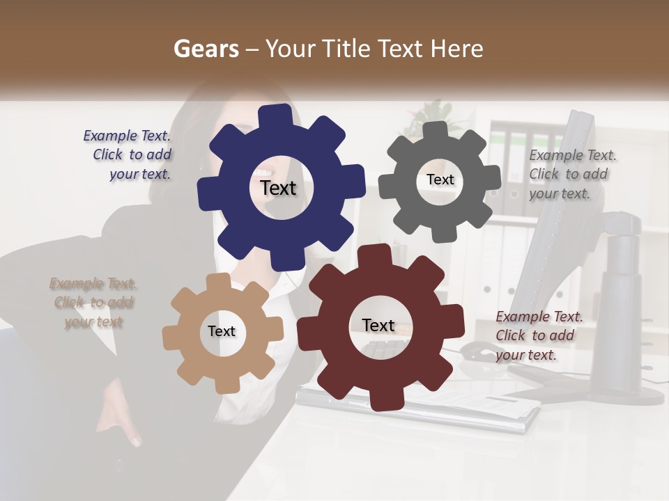 A Woman Sitting At A Desk In Front Of A Computer PowerPoint Template