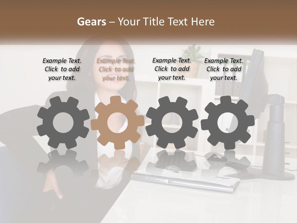 A Woman Sitting At A Desk In Front Of A Computer PowerPoint Template