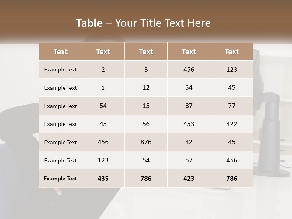A Woman Sitting At A Desk In Front Of A Computer PowerPoint Template