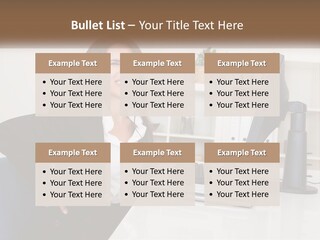 A Woman Sitting At A Desk In Front Of A Computer PowerPoint Template