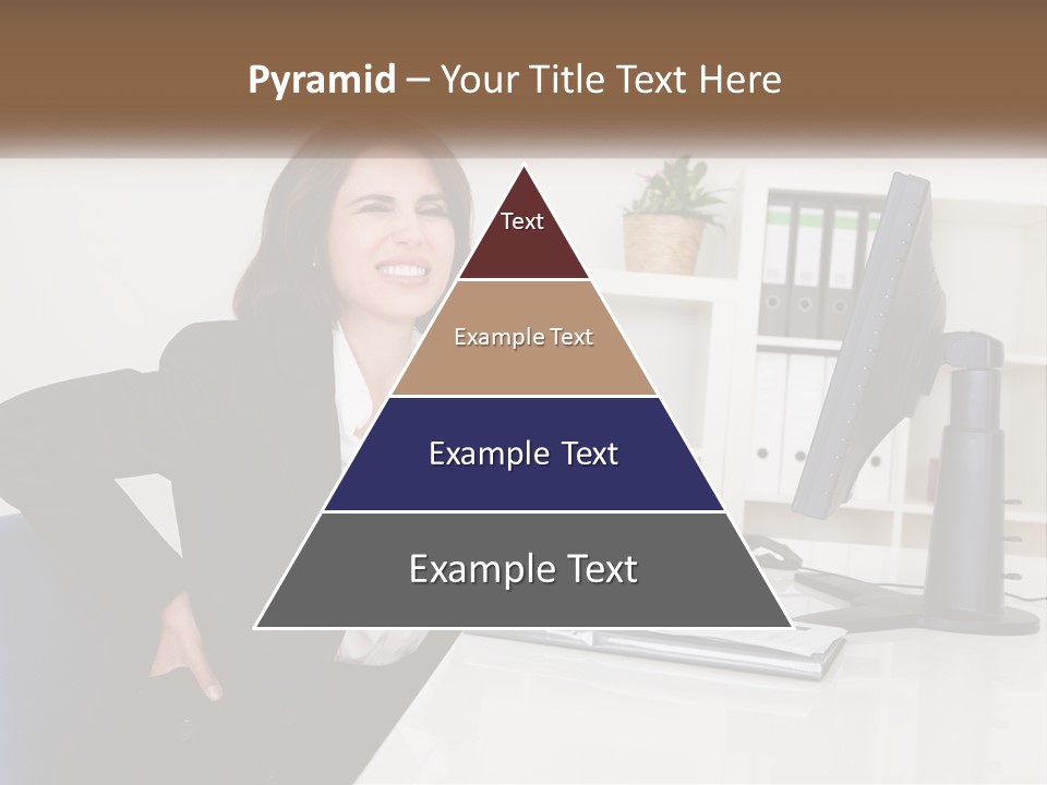 A Woman Sitting At A Desk In Front Of A Computer PowerPoint Template