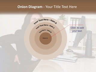 A Woman Sitting At A Desk In Front Of A Computer PowerPoint Template