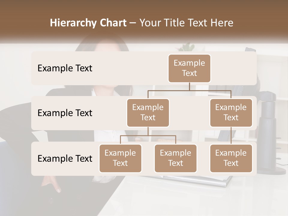 A Woman Sitting At A Desk In Front Of A Computer PowerPoint Template