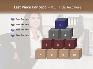 A Woman Sitting At A Desk In Front Of A Computer PowerPoint Template