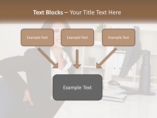 A Woman Sitting At A Desk In Front Of A Computer PowerPoint Template