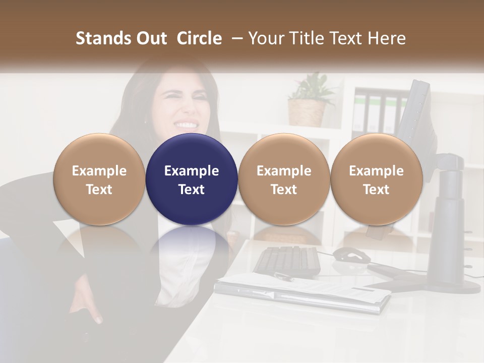 A Woman Sitting At A Desk In Front Of A Computer PowerPoint Template