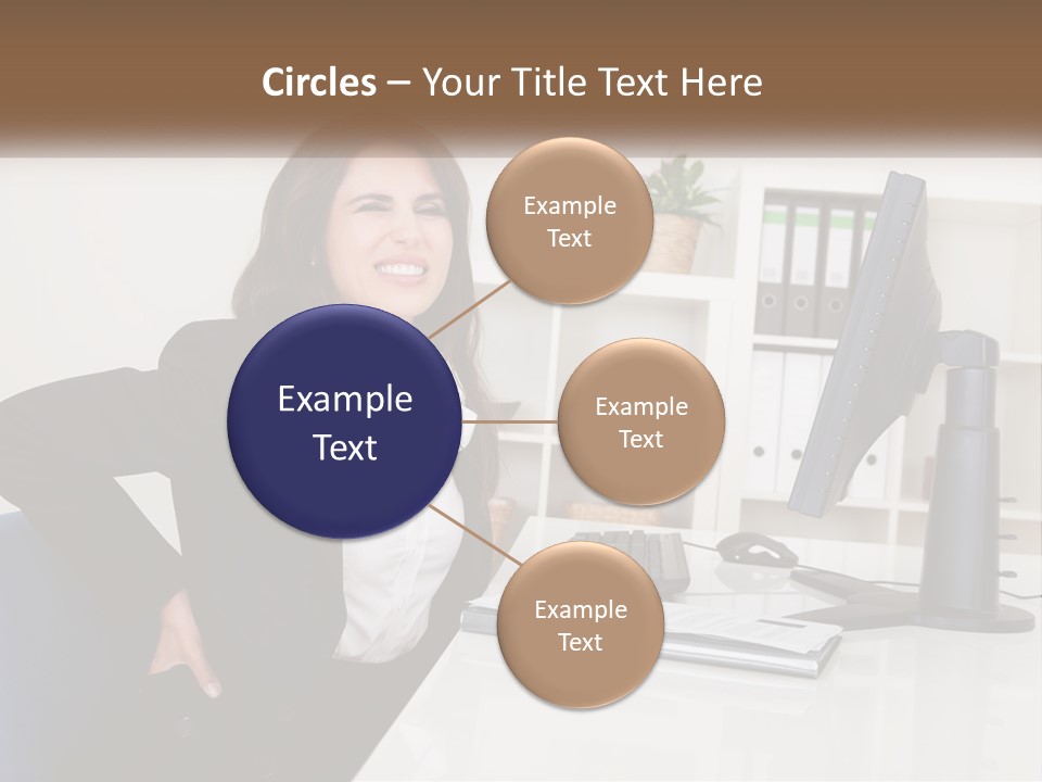 A Woman Sitting At A Desk In Front Of A Computer PowerPoint Template