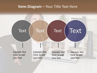 A Woman Sitting At A Desk In Front Of A Computer PowerPoint Template