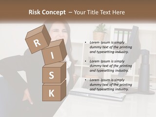 A Woman Sitting At A Desk In Front Of A Computer PowerPoint Template