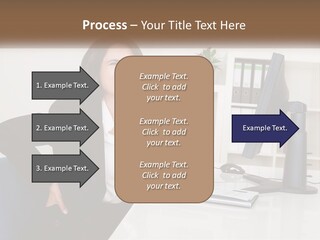 A Woman Sitting At A Desk In Front Of A Computer PowerPoint Template