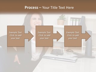 A Woman Sitting At A Desk In Front Of A Computer PowerPoint Template