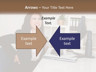 A Woman Sitting At A Desk In Front Of A Computer PowerPoint Template