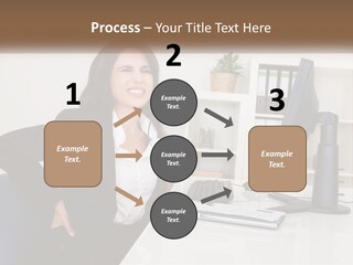 A Woman Sitting At A Desk In Front Of A Computer PowerPoint Template