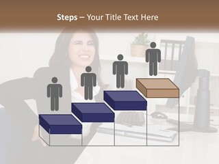 A Woman Sitting At A Desk In Front Of A Computer PowerPoint Template