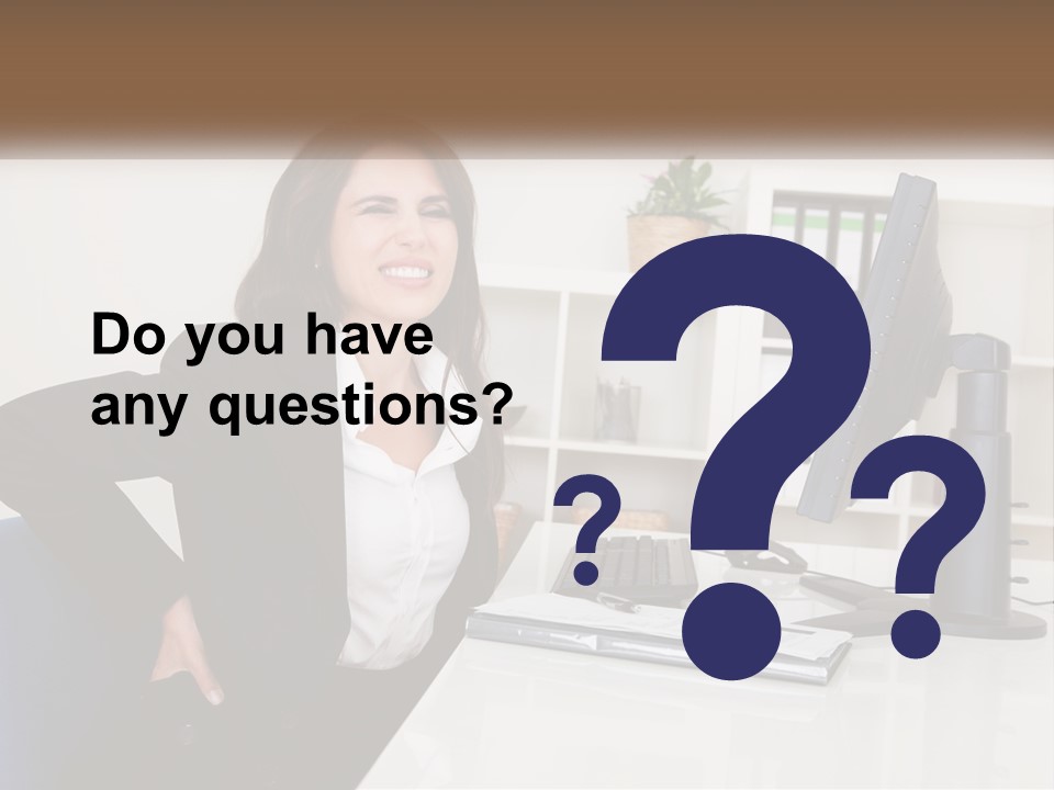 A Woman Sitting At A Desk In Front Of A Computer PowerPoint Template