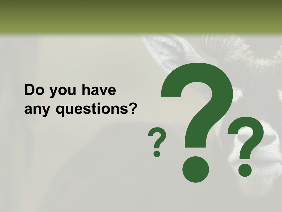 A Goat Standing Next To A Tree In A Field PowerPoint Template