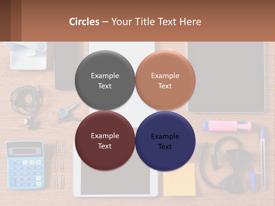 A Wooden Table Topped With Lots Of Office Supplies PowerPoint Template