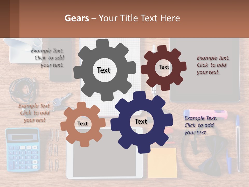 A Wooden Table Topped With Lots Of Office Supplies PowerPoint Template
