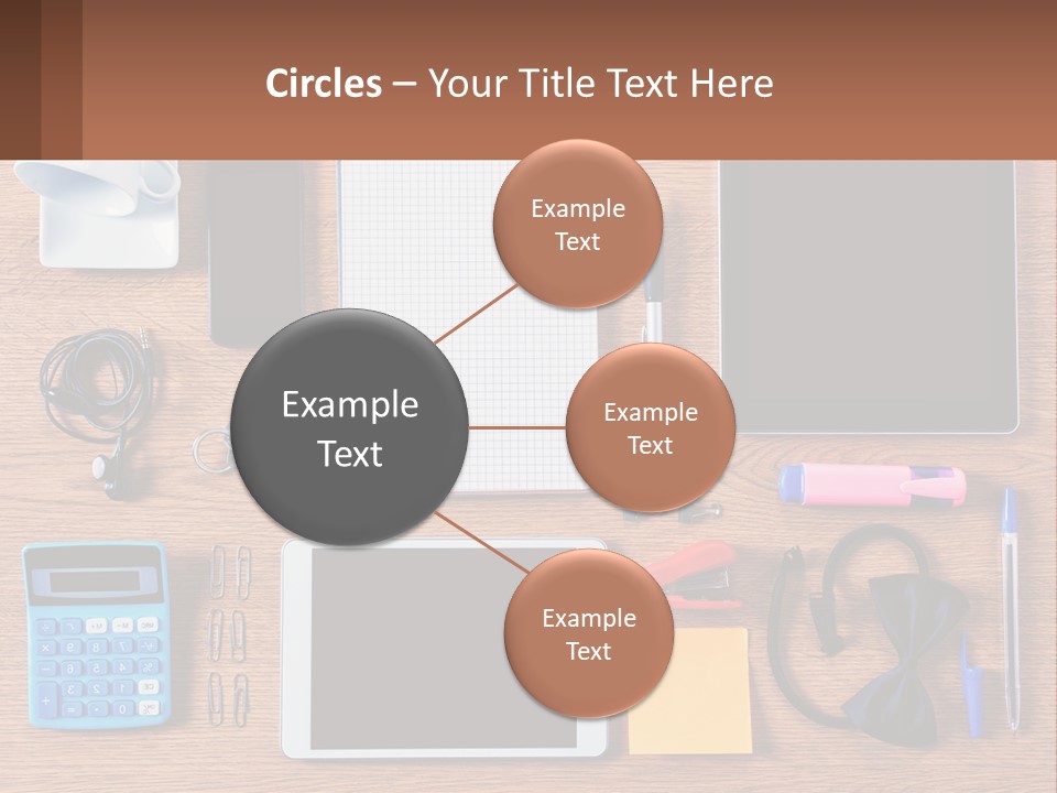 A Wooden Table Topped With Lots Of Office Supplies PowerPoint Template