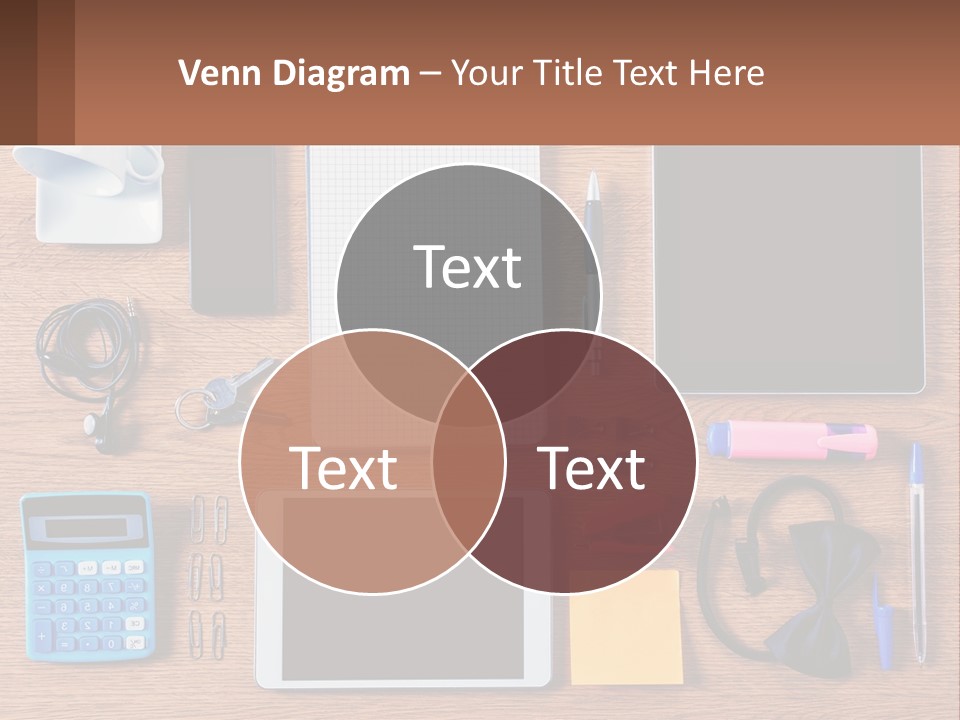 A Wooden Table Topped With Lots Of Office Supplies PowerPoint Template