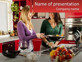 Two Women Standing In A Kitchen Preparing Food PowerPoint Template