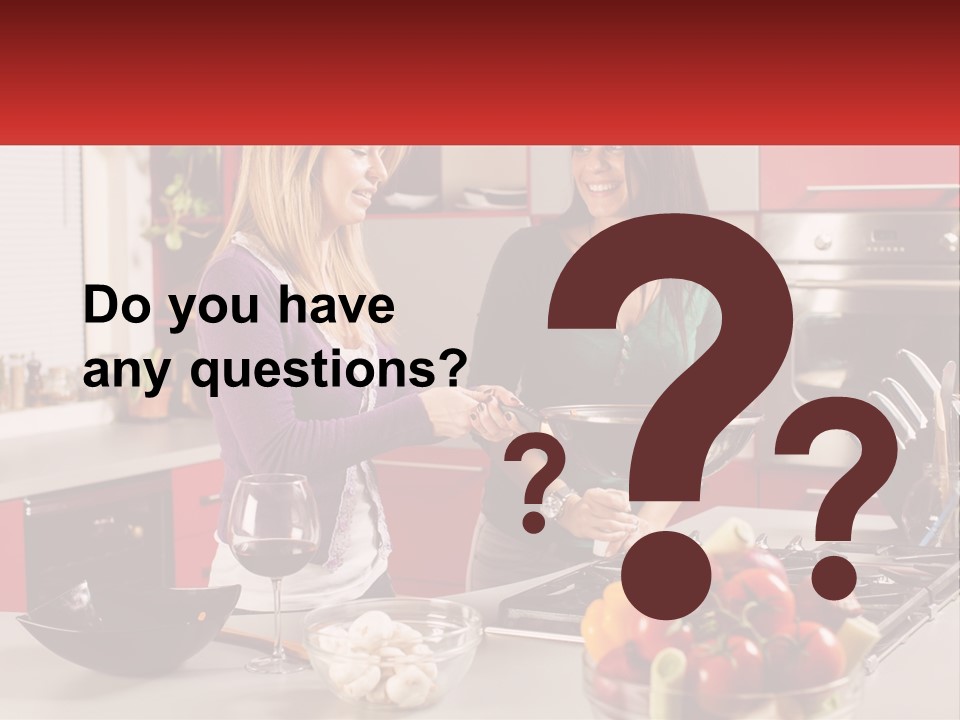 Two Women Standing In A Kitchen Preparing Food PowerPoint Template