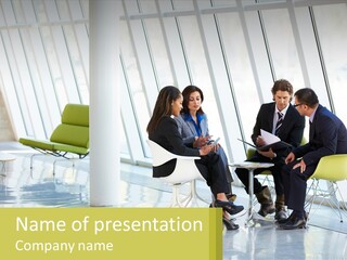A Group Of Business People Sitting Around A Table PowerPoint Template