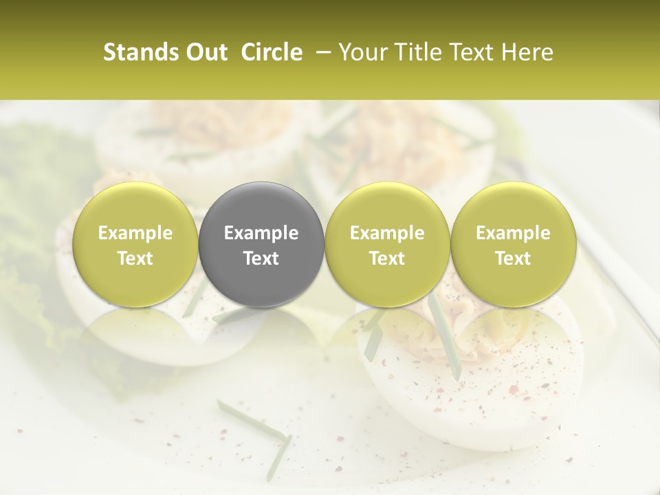 A White Plate Topped With Deviled Eggs Covered In Cheese PowerPoint Template