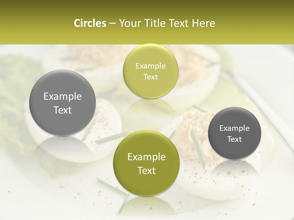 A White Plate Topped With Deviled Eggs Covered In Cheese PowerPoint Template