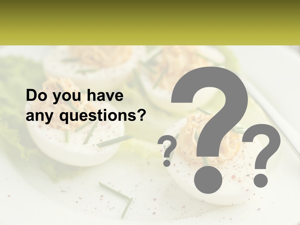A White Plate Topped With Deviled Eggs Covered In Cheese PowerPoint Template