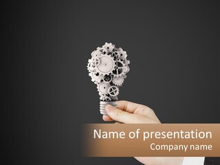 A Person Holding A Mechanical Device In Their Hand PowerPoint Template