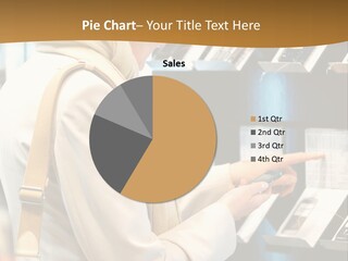 A Woman Is Looking At A Display Of Cell Phones PowerPoint Template