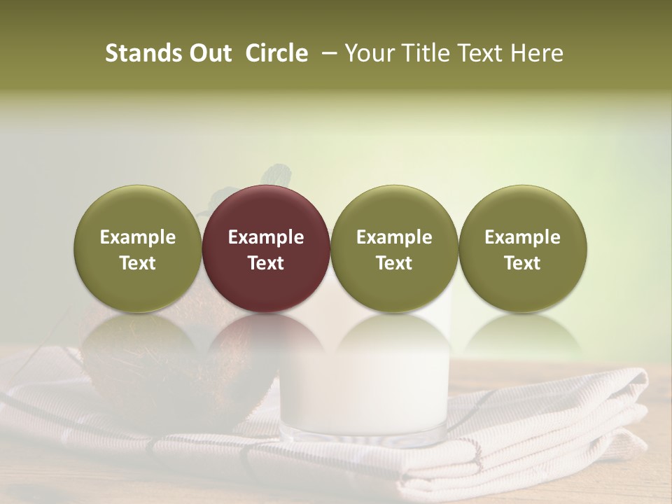 A Glass Of Milk Next To A Coconut On A Table PowerPoint Template