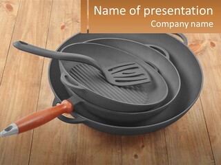 A Frying Pan With A Spatula On Top Of It PowerPoint Template