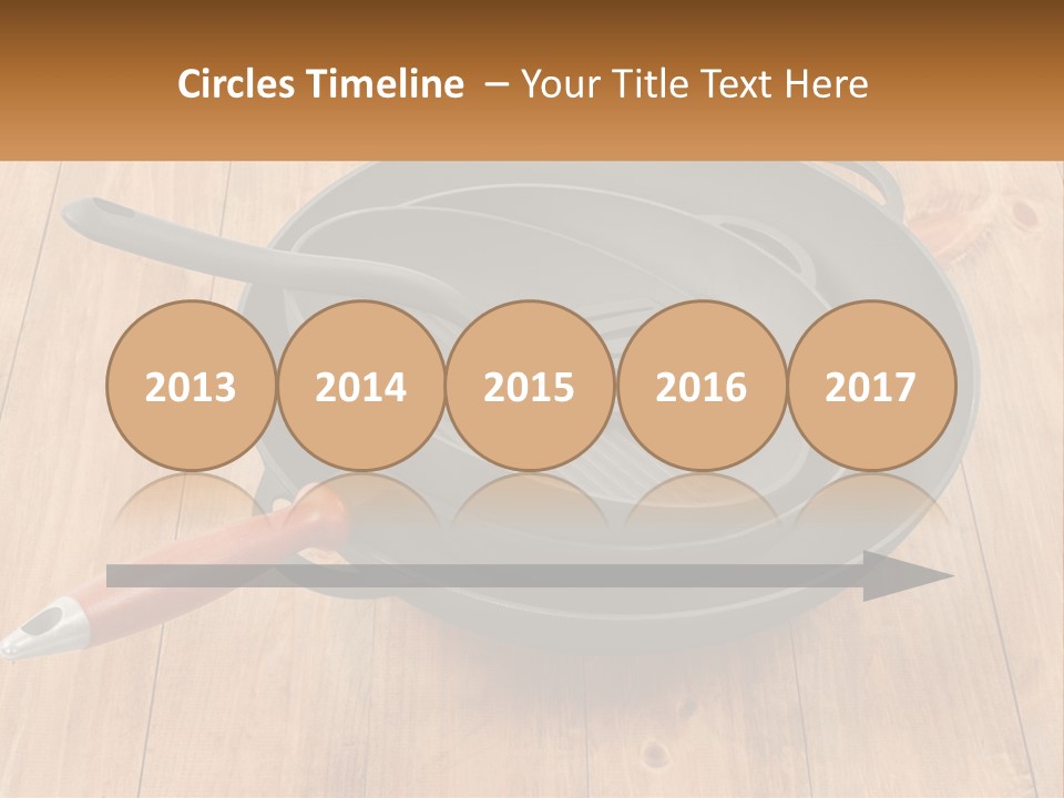 A Frying Pan With A Spatula On Top Of It PowerPoint Template